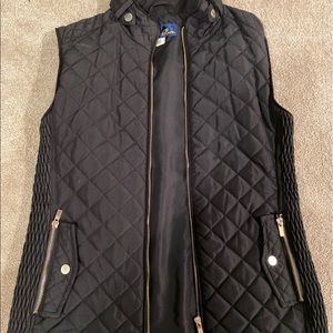 Black and gold vest